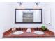Bathroom features double sinks, granite countertops, and modern lighting at 9740 E Gold Dust Ave, Scottsdale, AZ 85258
