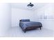 Bright bedroom featuring shuttered windows and modern light fixture at 9740 E Gold Dust Ave, Scottsdale, AZ 85258