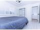 Bedroom featuring shuttered windows and large closet at 9740 E Gold Dust Ave, Scottsdale, AZ 85258