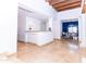 View of the dining area and wet bar with tile flooring and white walls at 9740 E Gold Dust Ave, Scottsdale, AZ 85258