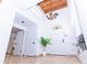 Bright foyer features a wood beam ceiling, chandelier, and stained glass front door at 9740 E Gold Dust Ave, Scottsdale, AZ 85258