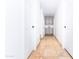 Hallway features neutral colors and leads to bright rooms at 9740 E Gold Dust Ave, Scottsdale, AZ 85258
