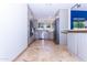 Well-lit kitchen showcases stainless steel appliances, ample cabinets, and a functional design for culinary enthusiasts at 9740 E Gold Dust Ave, Scottsdale, AZ 85258
