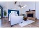 Bright living room with vaulted ceilings, fireplace, tile flooring, and natural light at 9740 E Gold Dust Ave, Scottsdale, AZ 85258