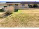 Expansive backyard with a covered patio, providing ample space for outdoor relaxation and entertaining at 9814 N Balboa Dr, Sun City, AZ 85351