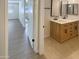Modern bathroom featuring a double sink vanity, providing comfort and style at 9814 N Balboa Dr, Sun City, AZ 85351