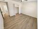 Bright bedroom with closet features durable floors, creating a serene atmosphere at 9814 N Balboa Dr, Sun City, AZ 85351