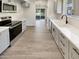 Modern kitchen with updated appliances, sleek countertops and ample cabinet space at 9814 N Balboa Dr, Sun City, AZ 85351