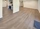 Spacious living area features durable floors and seamless flow to the kitchen at 9814 N Balboa Dr, Sun City, AZ 85351