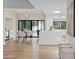 Open dining room with hardwood floors, modern furniture, and easy access to the outdoor pool at 10435 N 98Th St, Scottsdale, AZ 85258