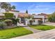 Beautiful property featuring lush lawn, landscaped yard, private courtyard, tile roof and stucco walls at 10435 N 98Th St, Scottsdale, AZ 85258
