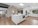 Bright kitchen with a large island, modern appliances, and sleek white cabinetry at 10435 N 98Th St, Scottsdale, AZ 85258