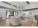 Bright living room with high vaulted ceilings, wood floors, lots of natural light and seamless indoor/outdoor living at 10435 N 98Th St, Scottsdale, AZ 85258