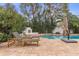 Backyard with a large pool and an outdoor fireplace at 10435 N 98Th St, Scottsdale, AZ 85258