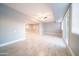 Bright and open living room with sliding doors leading to the backyard patio at 10523 W Roundelay Cir, Sun City, AZ 85351