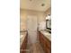 This bathroom features a double vanity and a tiled floor at 11772 E Clinton St, Scottsdale, AZ 85259