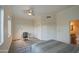 Spacious bedroom with ample natural light, desk area, and access to the ensuite bathroom at 11772 E Clinton St, Scottsdale, AZ 85259