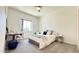 Relaxing bedroom features a comfortable bed, natural light, and a neutral color scheme at 11772 E Clinton St, Scottsdale, AZ 85259