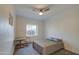 Serene bedroom with neutral tones, a window view, and comfortable furnishings at 11772 E Clinton St, Scottsdale, AZ 85259