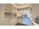 This walk in closet has shelving and carpet flooring at 11772 E Clinton St, Scottsdale, AZ 85259