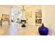 Open-concept dining area showcases a table set for two and views of the kitchen at 11772 E Clinton St, Scottsdale, AZ 85259