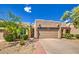 Charming single-story home with a two-car garage and low-maintenance desert landscaping at 11772 E Clinton St, Scottsdale, AZ 85259