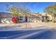 Attractive single-story home featuring desert landscaping, a two-car garage, and inviting curb appeal at 11772 E Clinton St, Scottsdale, AZ 85259