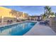 Large community pool offers a refreshing escape, complete with ample lounge seating at 11772 E Clinton St, Scottsdale, AZ 85259