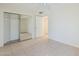 Bright bedroom featuring tile floors, mirrored closet doors and neutral paint at 11840 N 40Th Way, Phoenix, AZ 85028