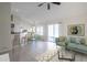 Inviting open-concept living area with bar seating, a dining nook, and sliding glass doors at 11840 N 40Th Way, Phoenix, AZ 85028