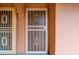 Front door with decorative security screen and a door viewer for added safety at 12212 N Paradise Village S Pkwy # 146, Phoenix, AZ 85032