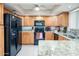 Well-equipped kitchen with stainless steel appliances, ample storage, and a stylish granite countertop at 12212 N Paradise Village S Pkwy # 146, Phoenix, AZ 85032