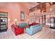 Bright lobby featuring tile floors, comfortable seating, and a soaring ceiling with an ornate chandelier at 12212 N Paradise Village S Pkwy # 146, Phoenix, AZ 85032