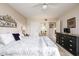 Well-lit main bedroom with a ceiling fan, neutral walls, and comfortable furnishings create a welcoming space at 12212 N Paradise Village S Pkwy # 146, Phoenix, AZ 85032