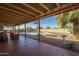 Inviting covered outdoor patio leading to a refreshing backyard pool at 1226 N Nevada Way, Mesa, AZ 85203