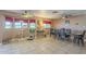 Bright dining area with a modern ceiling fan and a lovely view at 1226 N Nevada Way, Mesa, AZ 85203