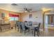 Formal dining room boasts stylish furniture with seating for six and natural light at 1226 N Nevada Way, Mesa, AZ 85203