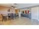 Open dining room with a view into the living room, creating an inviting space for gatherings at 1226 N Nevada Way, Mesa, AZ 85203