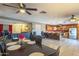 Spacious dining area featuring an open floor plan with a view to the adjacent kitchen and living area at 1226 N Nevada Way, Mesa, AZ 85203
