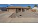 Charming single-story home with low-maintenance desert landscaping and a two-car garage at 1226 N Nevada Way, Mesa, AZ 85203