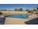 Backyard pool featuring a large pool, desert landscaping, and privacy wall at 1226 N Nevada Way, Mesa, AZ 85203