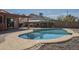 Beautiful backyard with pool, covered patio, built-in bbq, and bar at 1226 N Nevada Way, Mesa, AZ 85203