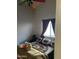 Cozy bedroom with colorful bedspread and playful ceiling fan at 12565 W Amelia Ave, Avondale, AZ 85392