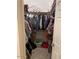 Walk-in closet with ample storage space for clothes and accessories, with shelving and hanging rods at 12565 W Amelia Ave, Avondale, AZ 85392