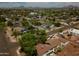 Neighborhood aerial view with tree-lined streets and mountain views at 1301 E Sheridan St, Phoenix, AZ 85006