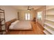 Sunlit bedroom featuring hardwood floors and a ceiling fan at 1301 E Sheridan St, Phoenix, AZ 85006