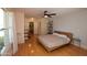 Bright, spacious bedroom with hardwood floors and a ceiling fan at 1301 E Sheridan St, Phoenix, AZ 85006