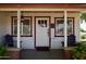 Inviting front porch with seating and charming details at 1301 E Sheridan St, Phoenix, AZ 85006