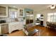 Bright kitchen featuring white cabinetry, stainless steel appliances, and a farmhouse sink at 1301 E Sheridan St, Phoenix, AZ 85006