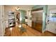 Modern kitchen with hardwood floors, stainless steel appliances, and stylish cabinets at 1301 E Sheridan St, Phoenix, AZ 85006